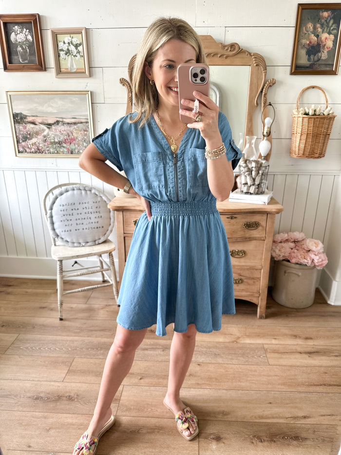 denim blue short dress with elastic around waist  