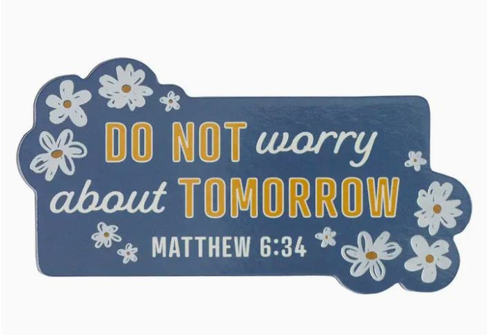 Decorative sign with 'Do Not Worry About Tomorrow' quote and flowers on a blue background