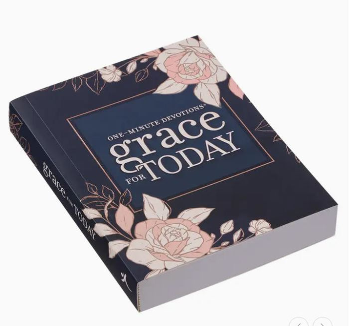 Book titled 'One-Minute Devotions grace TODAY' with floral designs on a white background