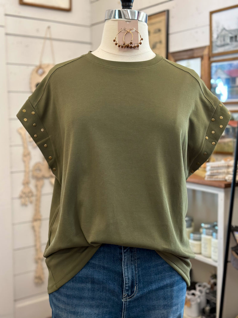 olive green top with bronze accents on sleeves