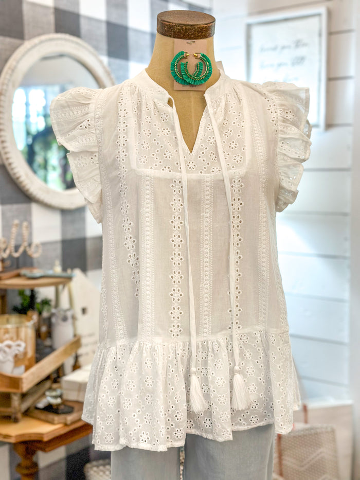 White eyelet lace top with flutter sleeves
