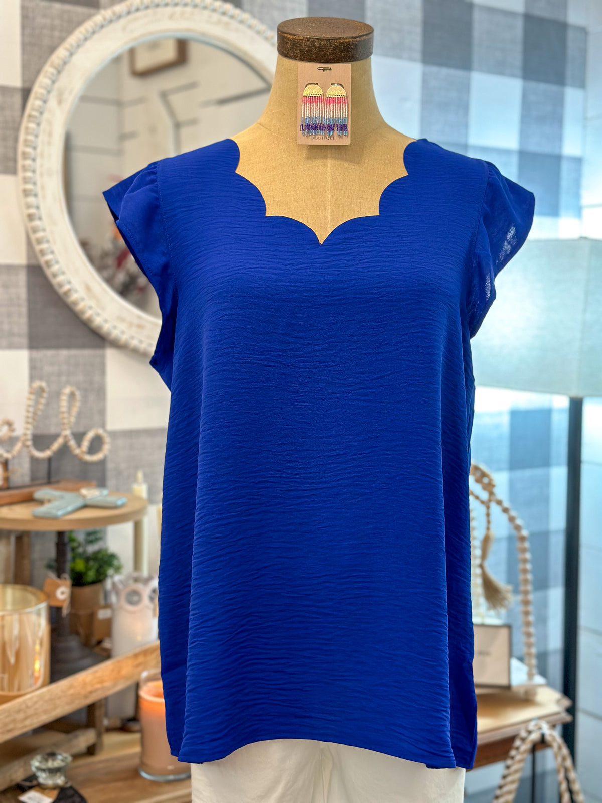 royal blue scallop neck and flutter sleeve top 