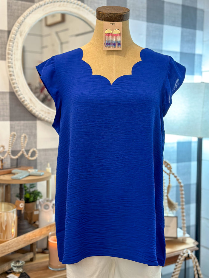 royal blue scallop neck and flutter sleeve top 