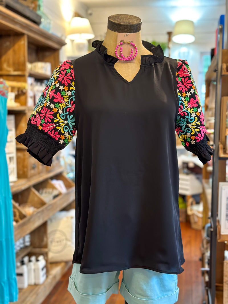 black ruffle neck with multi color embroidery sleeves