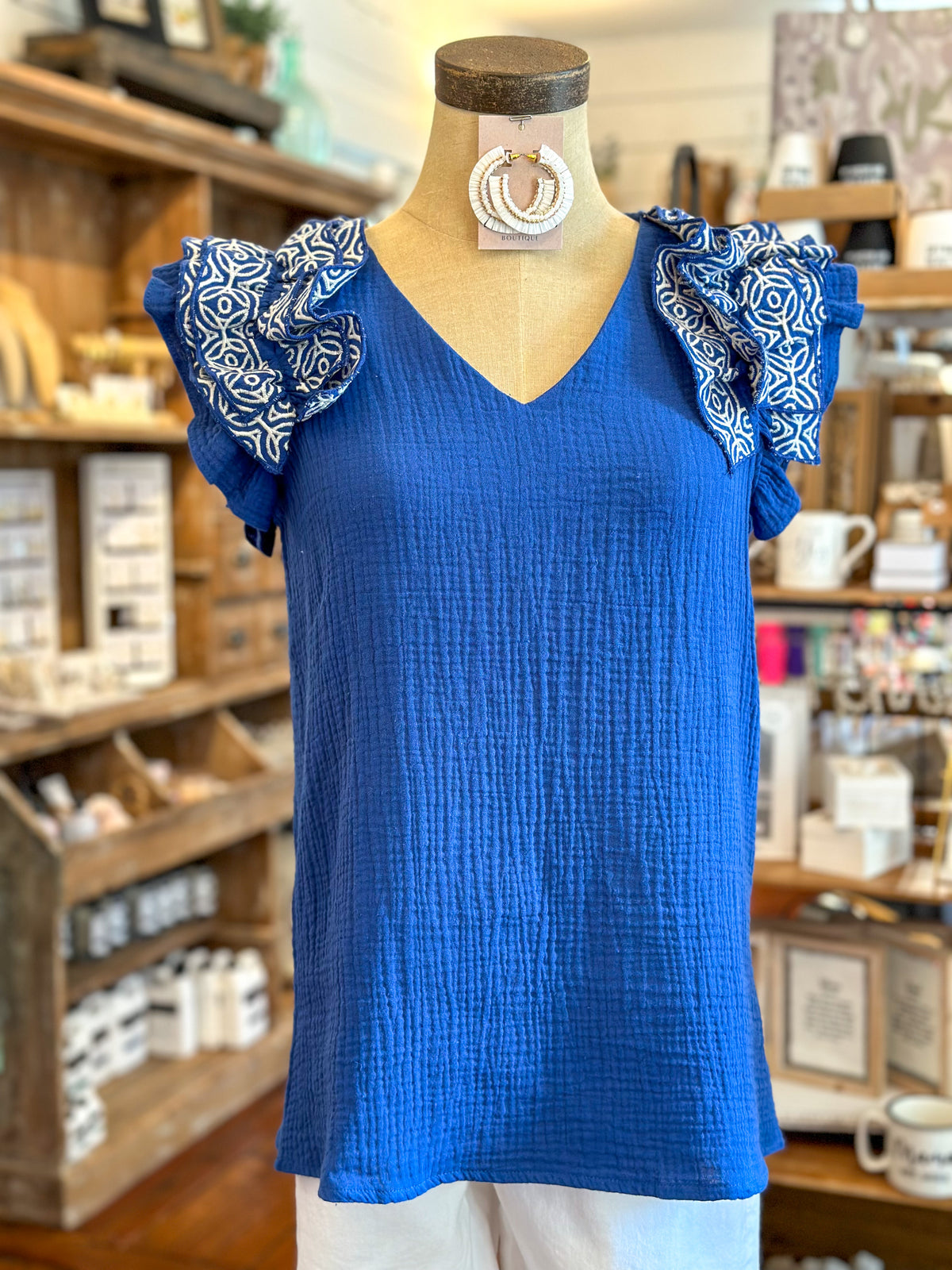 blue washco top with white embroidery ruffle sleeves  washco