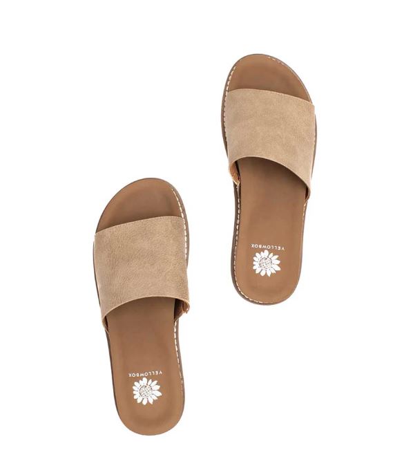 Pair of beige sandals with a brand logo on a white background kalo sandal taupe
