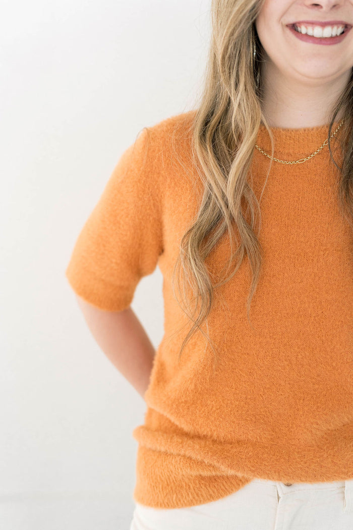 peach color fuzzy sweater top