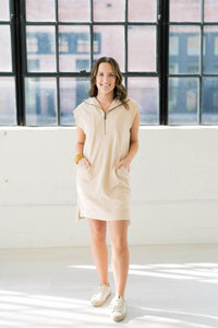 tan color sporty dress with pockets
