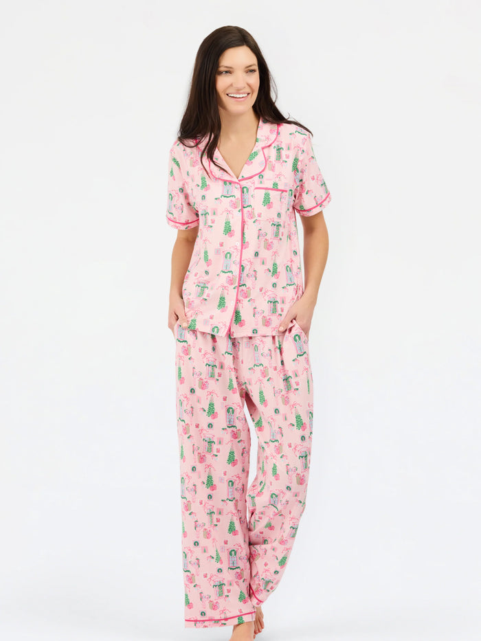pink women christmas cottage pajama set button down top with white background 