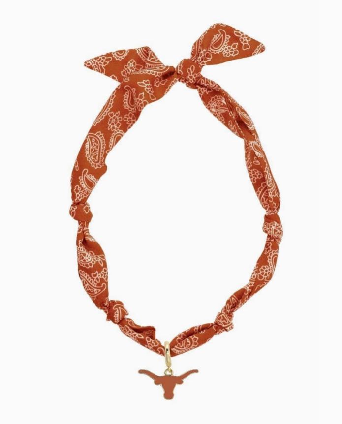 Orange bandana with a gold charm on a white background texas longhorns 
