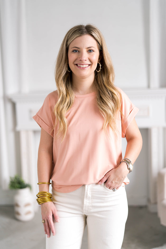 apricot color top with rolled sleeves