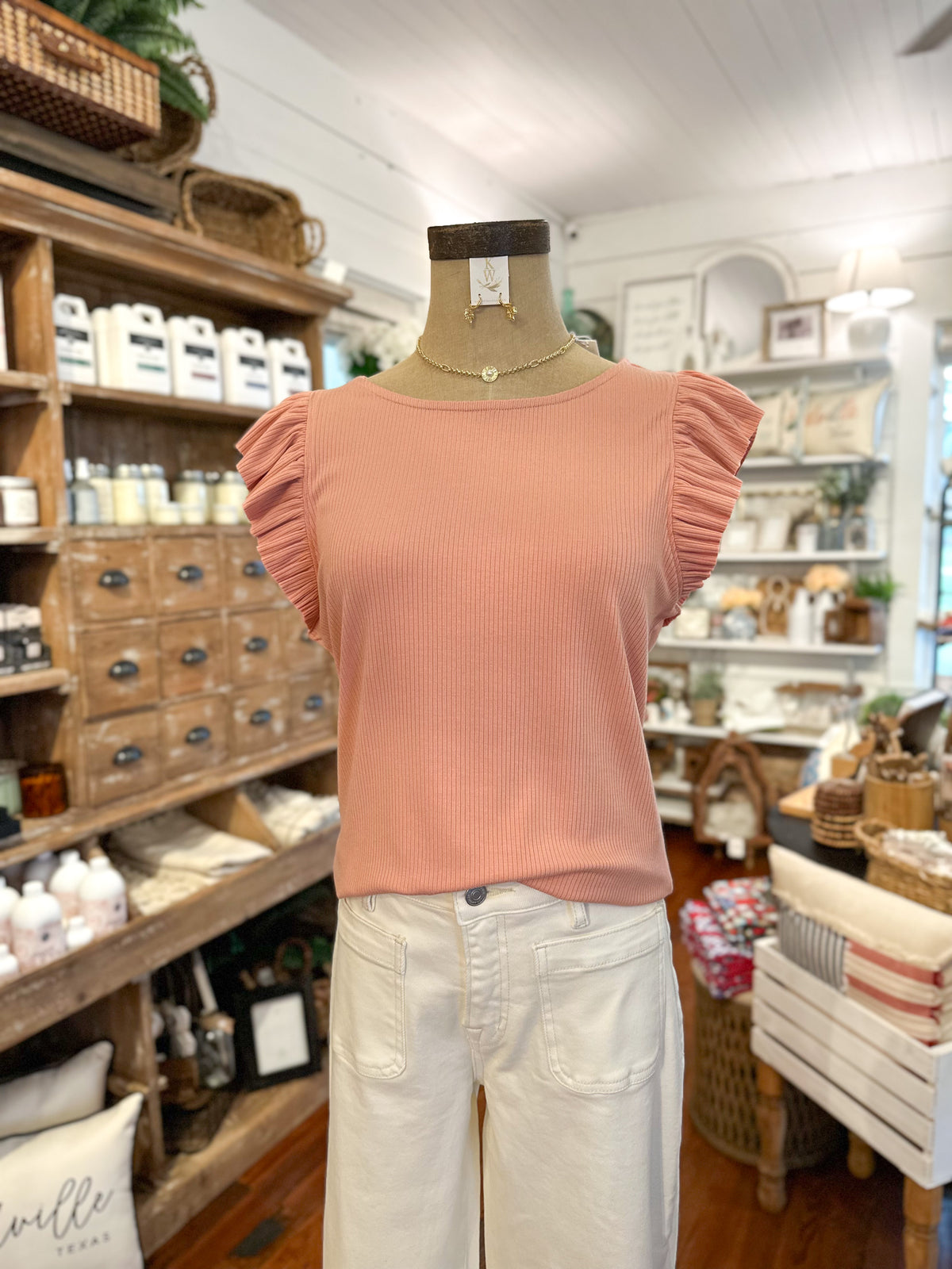 peach color ribbed short sleeve ruffle top