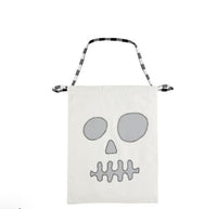 Tote bag with skull design on a white background mud pie treat bag