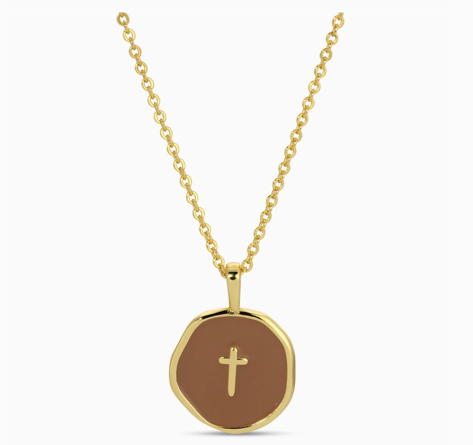 brown background tiny cross necklace 