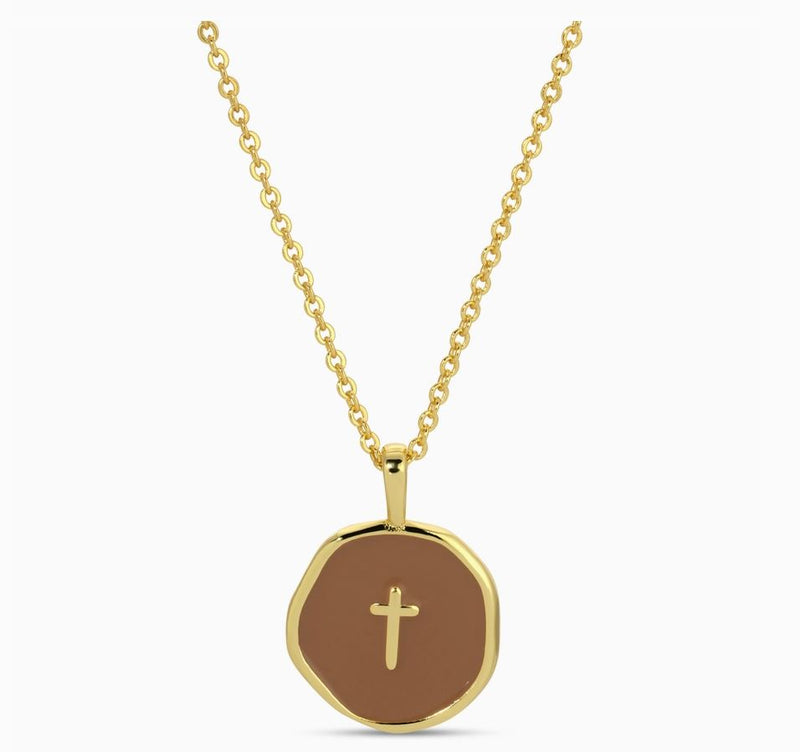 brown background tiny cross necklace 