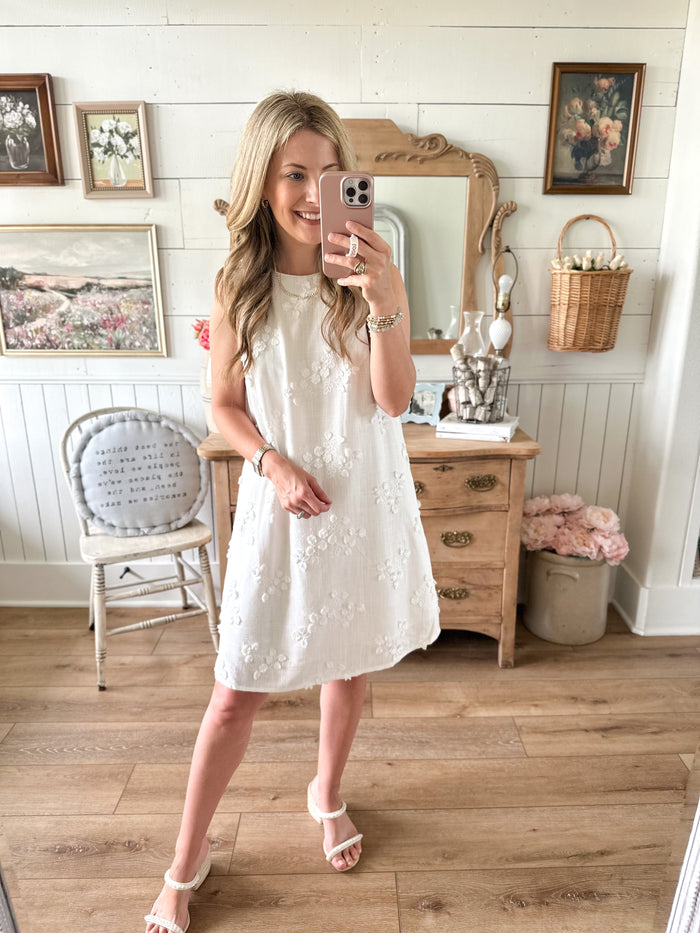 White linen blend dress with flower embroidery details 