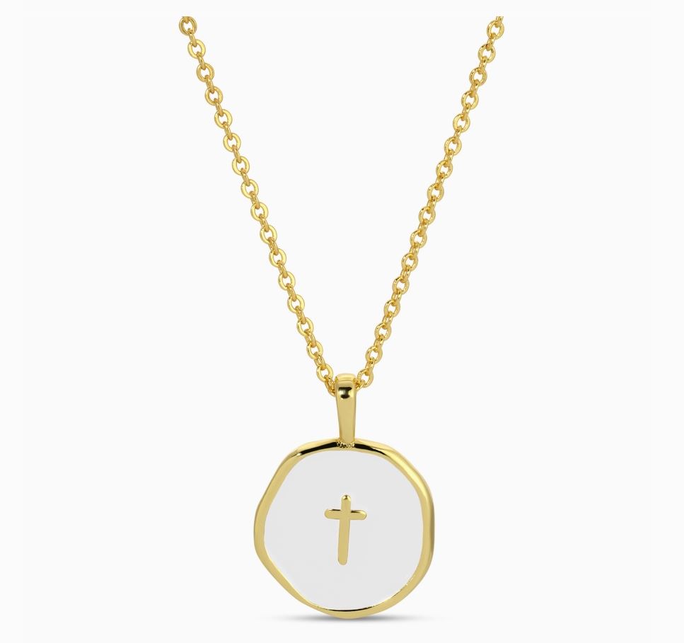 Gold necklace with a white pendant featuring a cross on a white background
