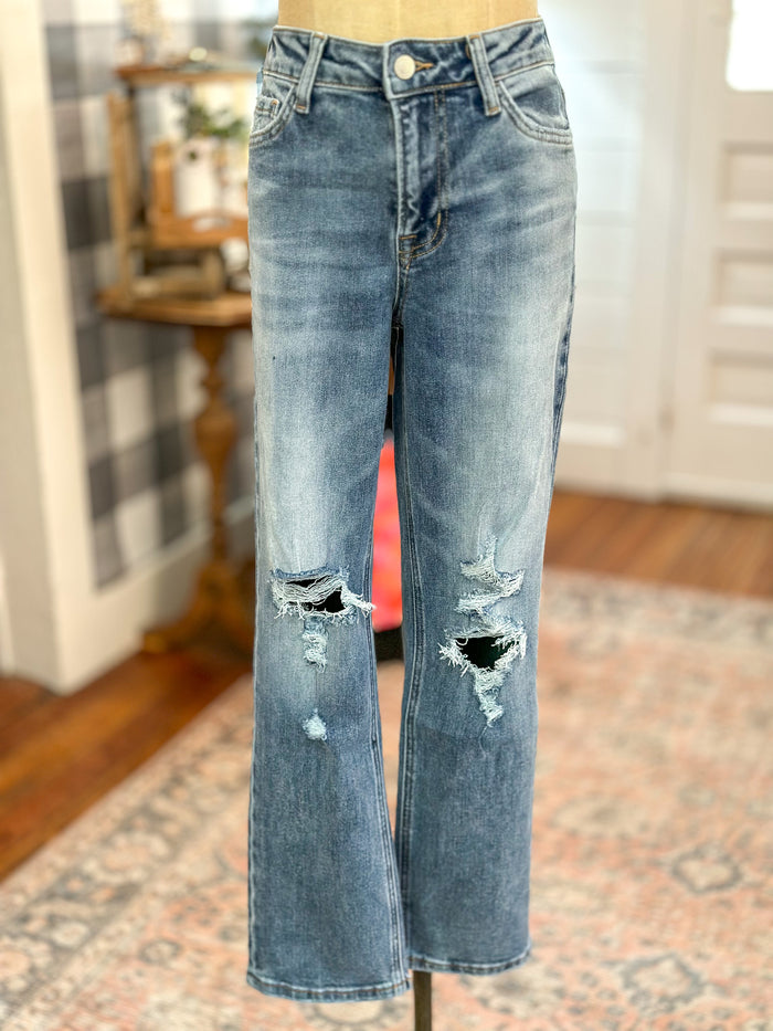 Light wash distressed straight leg vervet jean