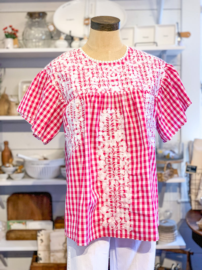 pink and white checkered top with white embroidery details penny top from layerz