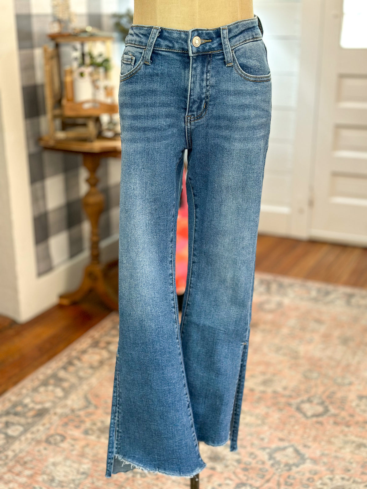 medium wash vervet crop flare with side slit and step hem