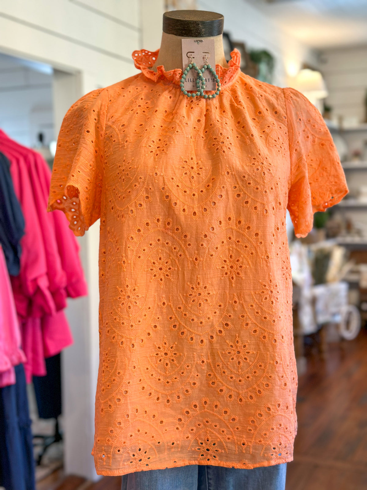 orange eyelet lace detail top