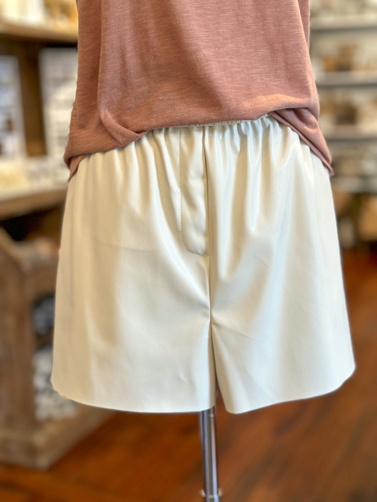 another love chelsey cream color faux leather short