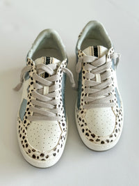 shu shop sneaker black and white