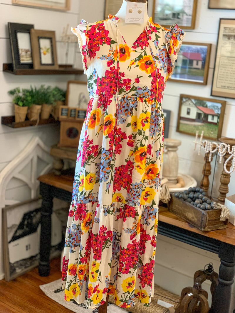 multi color floral dress with ruffle sleeves. thml brand