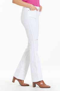 high rise white bootcut jean with holes at the knees